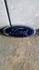 7U5A19H250AA FORD Emblema