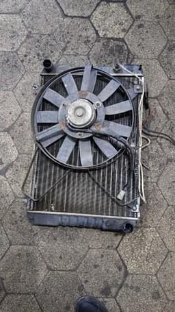 21410VL100 NISSAN Radiador original y equivalente